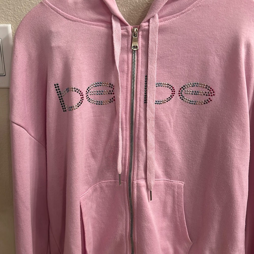 BEBE light purple zip hoodie. Metallic monogram beading in rainbow. Super cute